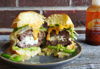 Goat Cheese Stuffed Burgers with Guacamole and Caramelized Onions